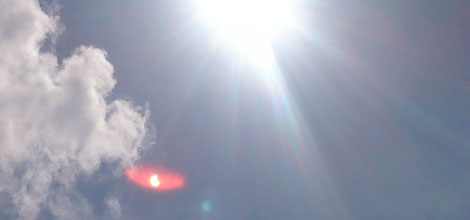  Solar eclipse seen in a lens aberration.